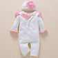 one-year-old baby wears newborn baby clothing romper jumpsuit